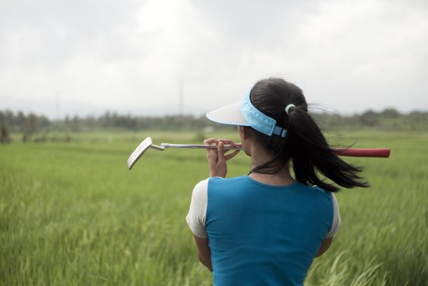 still / picture for A Lady Caddy Who Never Saw A Hole in One